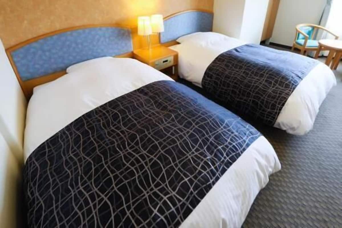 Desk, laptop workspace, blackout curtains, free WiFi