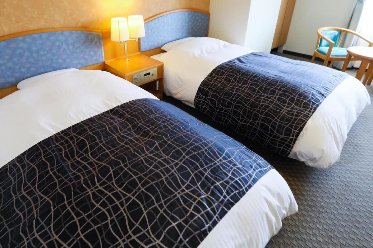 Desk, laptop workspace, blackout curtains, free WiFi