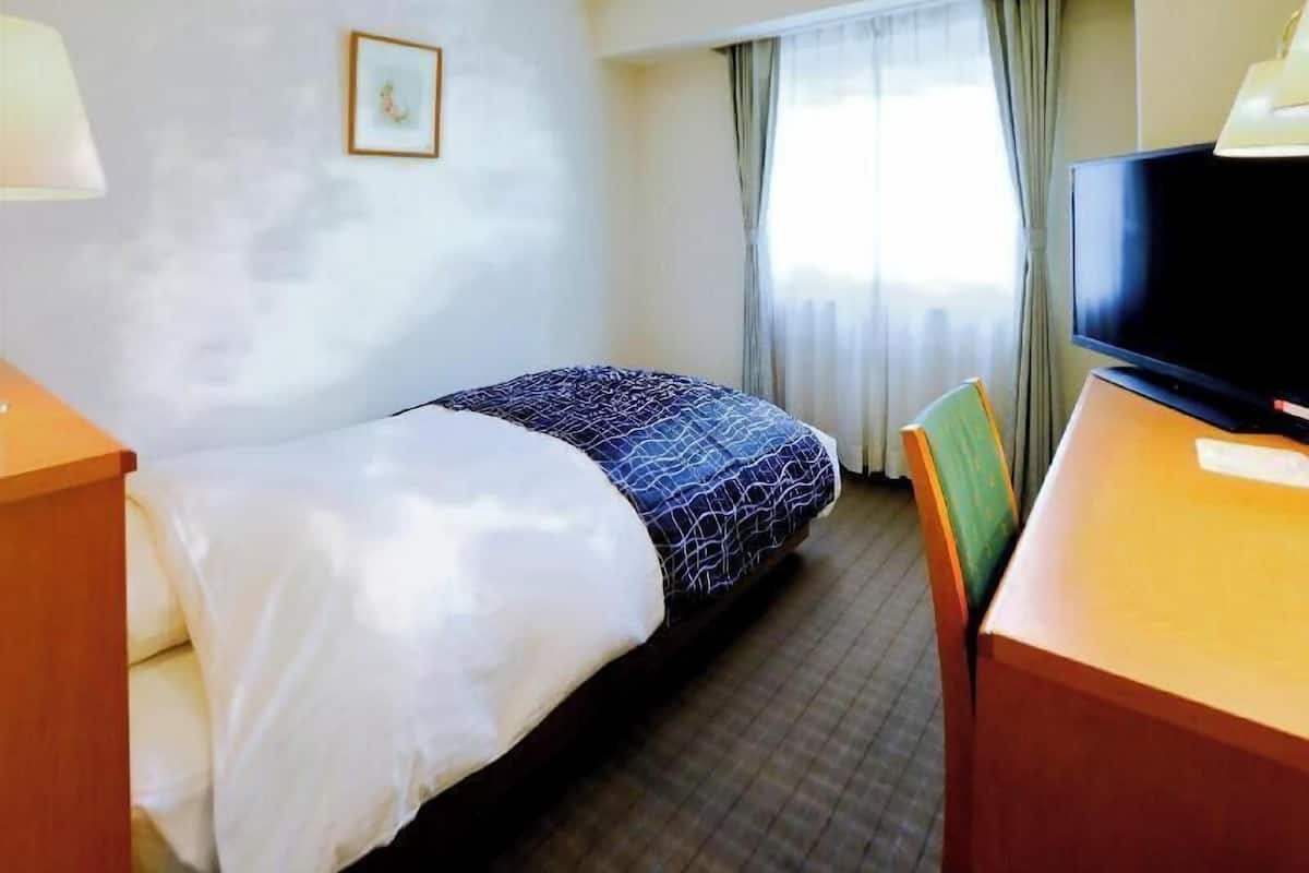 Desk, laptop workspace, blackout curtains, free WiFi