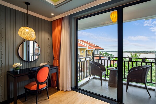Deluxe Room, Pool View | Down duvets, minibar, in-room safe, desk