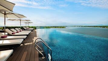 2 outdoor pools, pool umbrellas, pool loungers