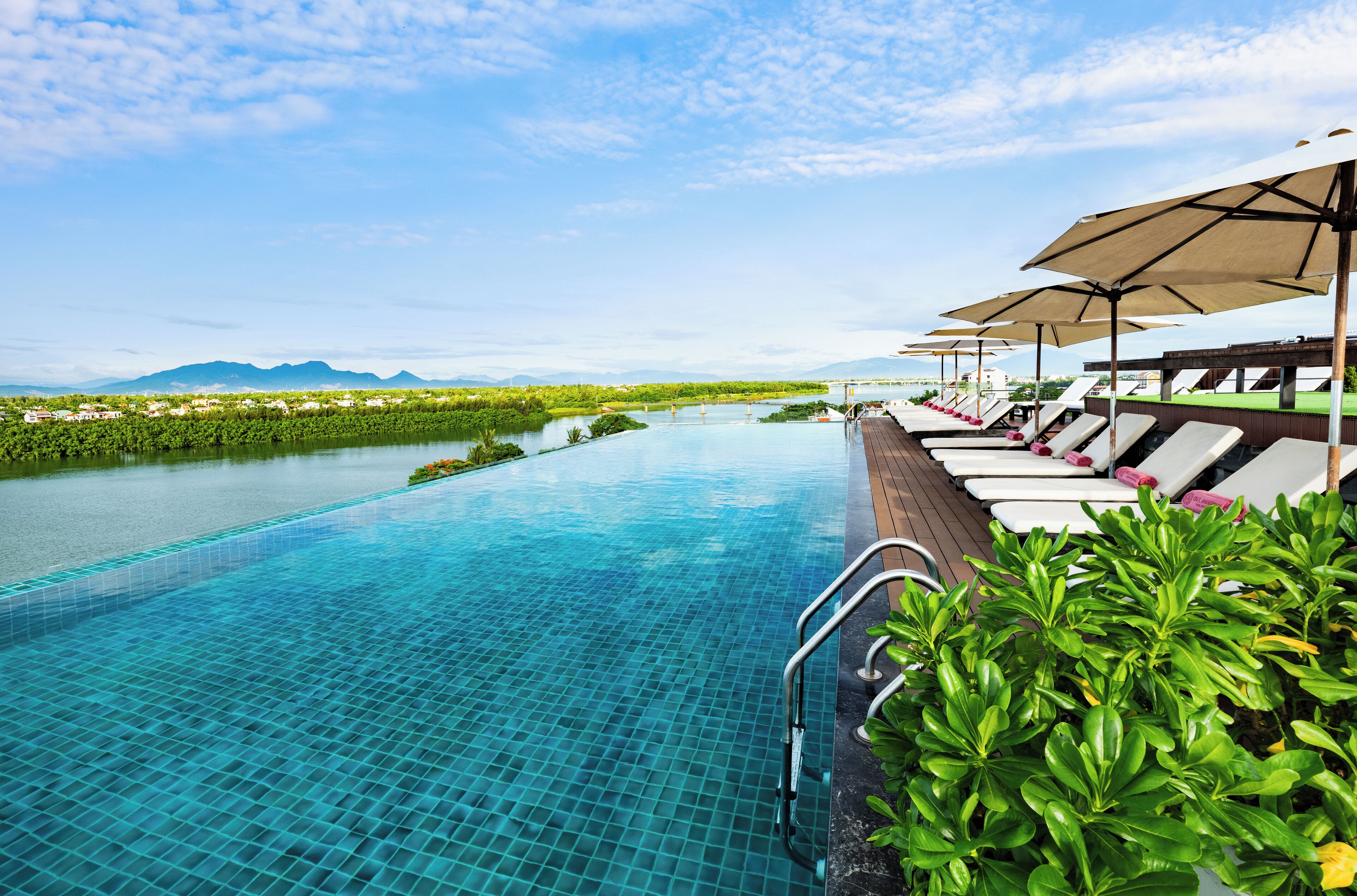 2 outdoor pools, pool umbrellas, pool loungers