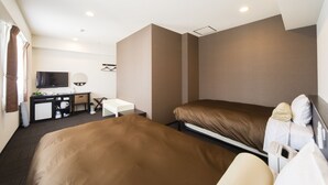 A hotel room with two beds, a desk, a television, and a small kitchenette. - Urbain Hiroshima Central (Hiroshima)