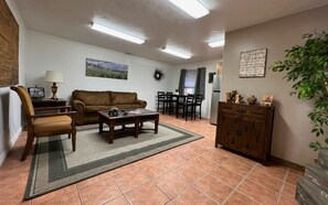 Comfort Suite (Bunny) | Living area | 40-inch Smart TV with digital channels, streaming services - The Snuggle Inn (Loa)