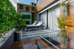 总统套房, 1 张特大床 | 起居区 | 44-英寸纯平电视 （配备卫星频道）、电视