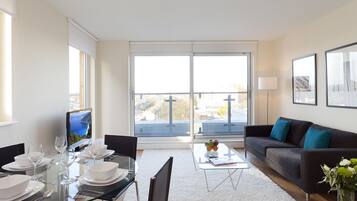 Flat-screen TV, DVD player, iPod dock