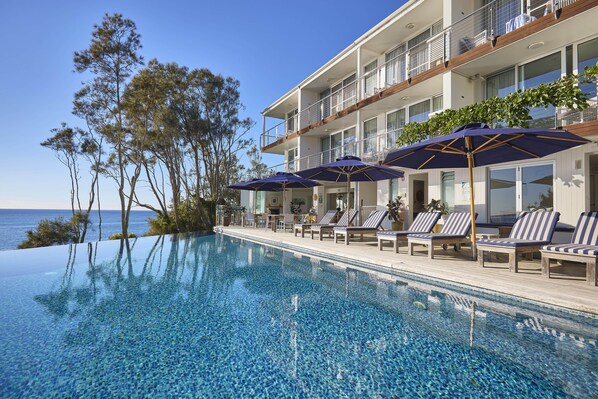 Outdoor pool, pool umbrellas, pool loungers