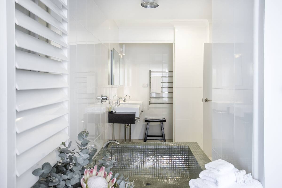 luxury suite | bathroom | shower, free toiletries, hair dryer, bathrobes