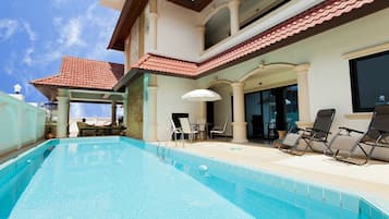 Outdoor pool, open 8:00 AM to 8:00 PM, pool umbrellas, pool loungers