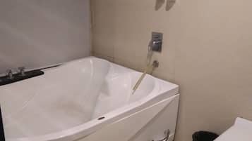 Eco-friendly toiletries, hair dryer, bathrobes, slippers