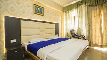 Gold Suite | Select Comfort beds, desk, free wired Internet, bed sheets