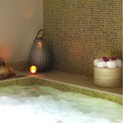 Hot tub, facials, 3 treatment rooms, manicures and pedicures, massages