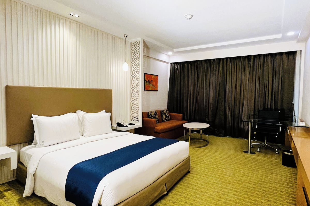 1 habitación, ropa de cama de alta calidad y minibar