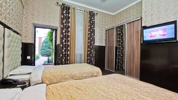 Habitación estándar con 1 cama doble o 2 individuales | Sábanas de algodón egipcio, edredones de plumas, minibar y caja fuerte