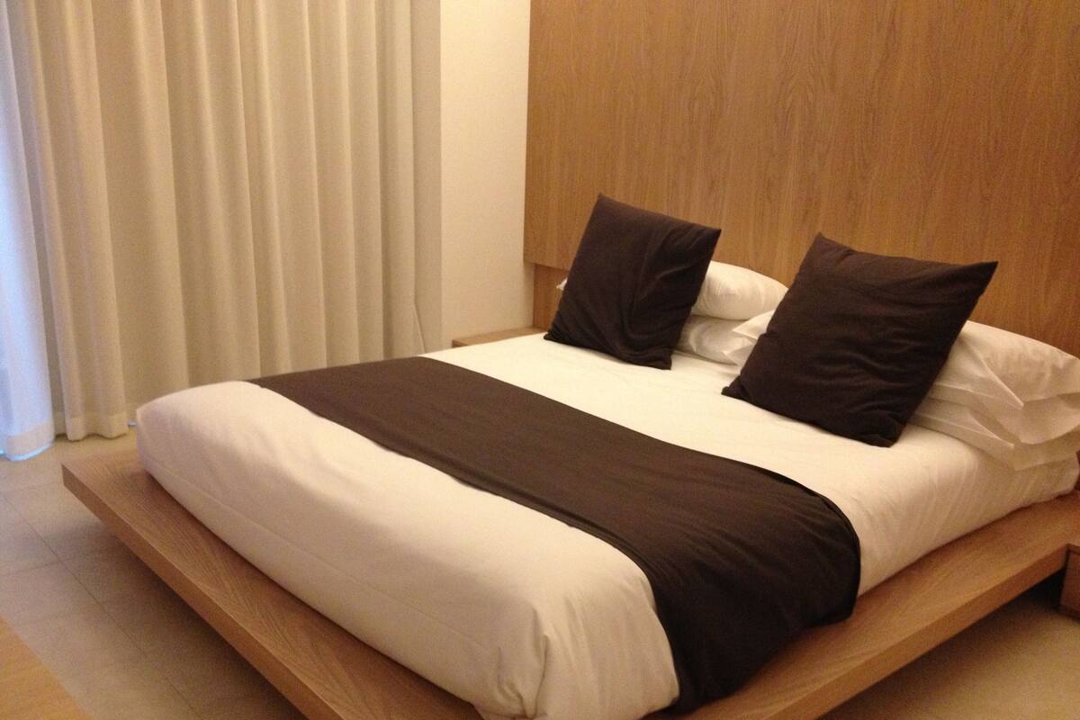 Apartment, 2 Bedrooms, Kitchenette, Sea View | Down comforters, memory foam beds, minibar, in-room safe
