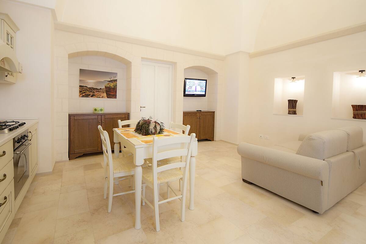 Executive Suite, 2 Bedrooms, Connecting Rooms | Living area | 32-inch TV with digital channels