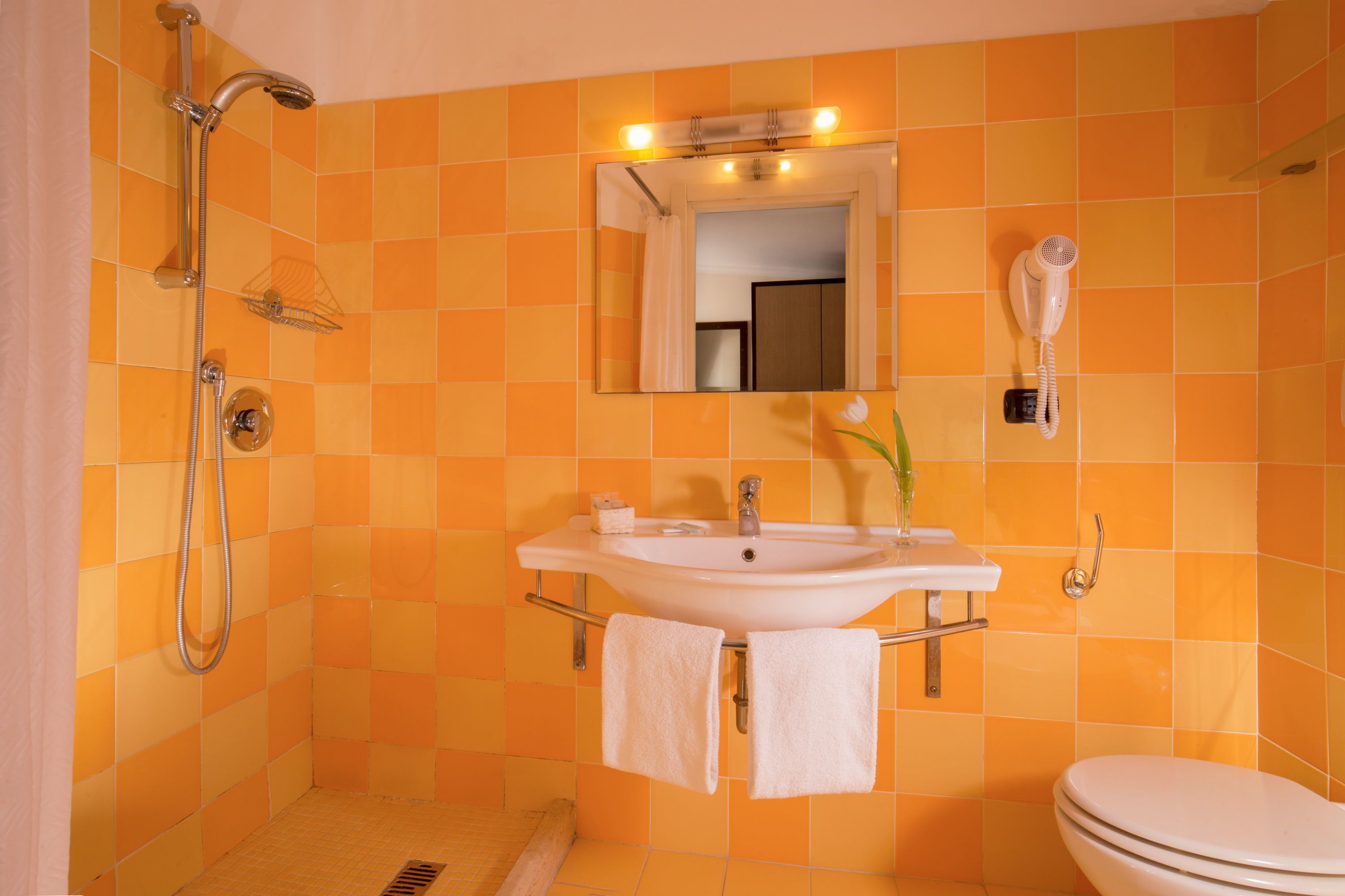 single room | bathroom | deep-soaking bathtub, rainfall showerhead, free toiletries, hair dryer