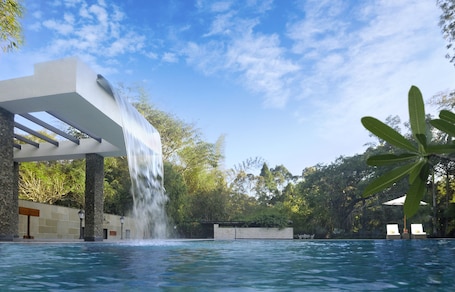 Outdoor pool, pool umbrellas, sun loungers