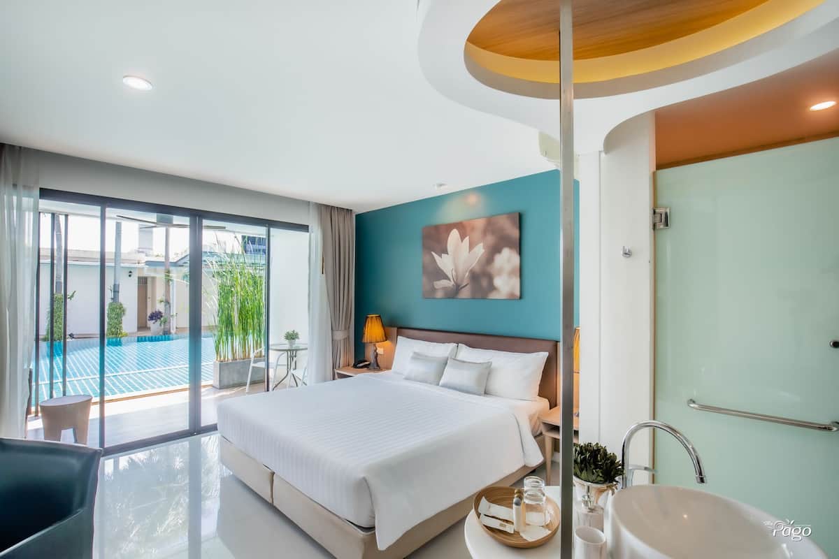 Deluxe Room, Pool Access | 1 bedroom, in-room safe, individually decorated, desk