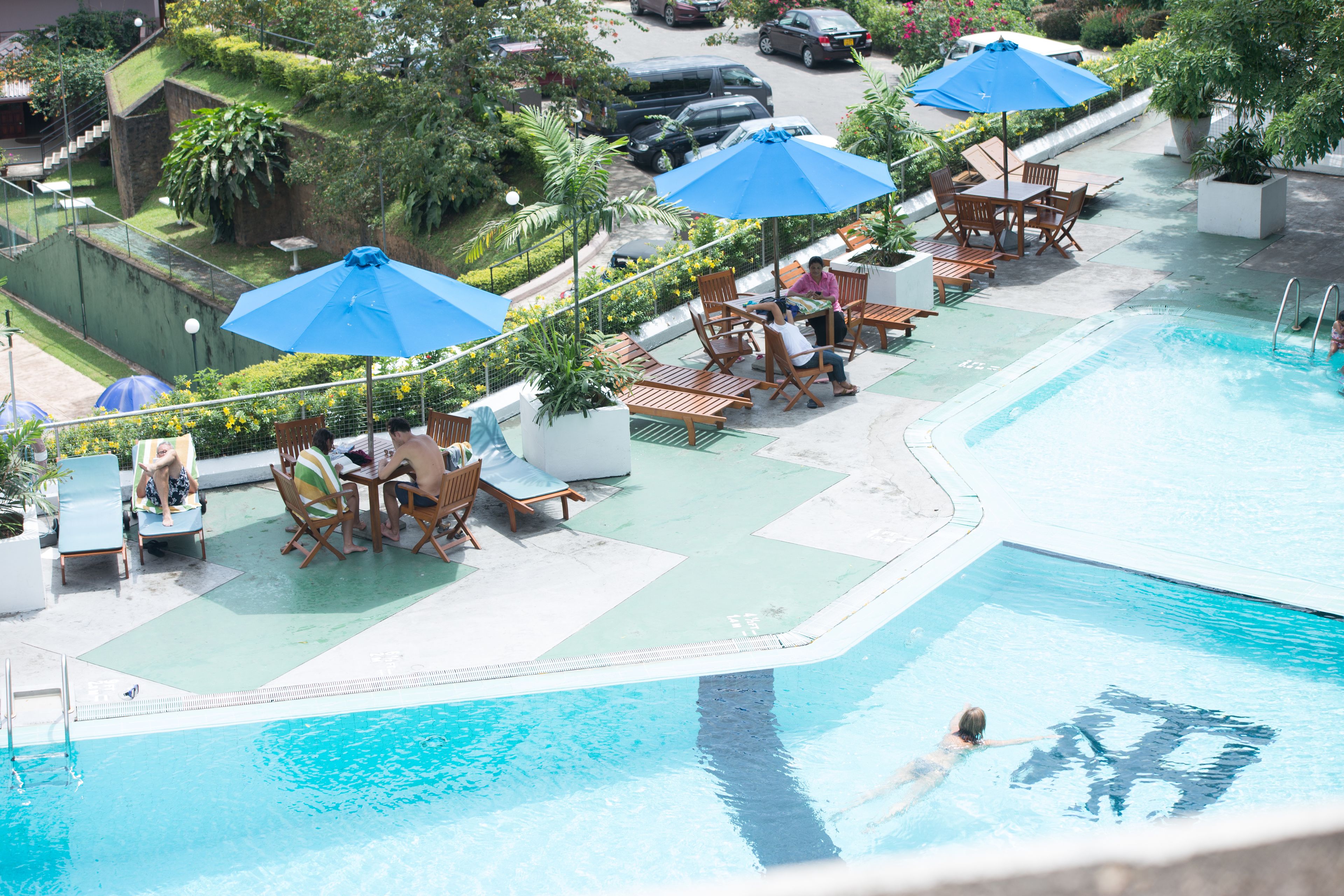 outdoor pool, pool umbrellas, pool loungers