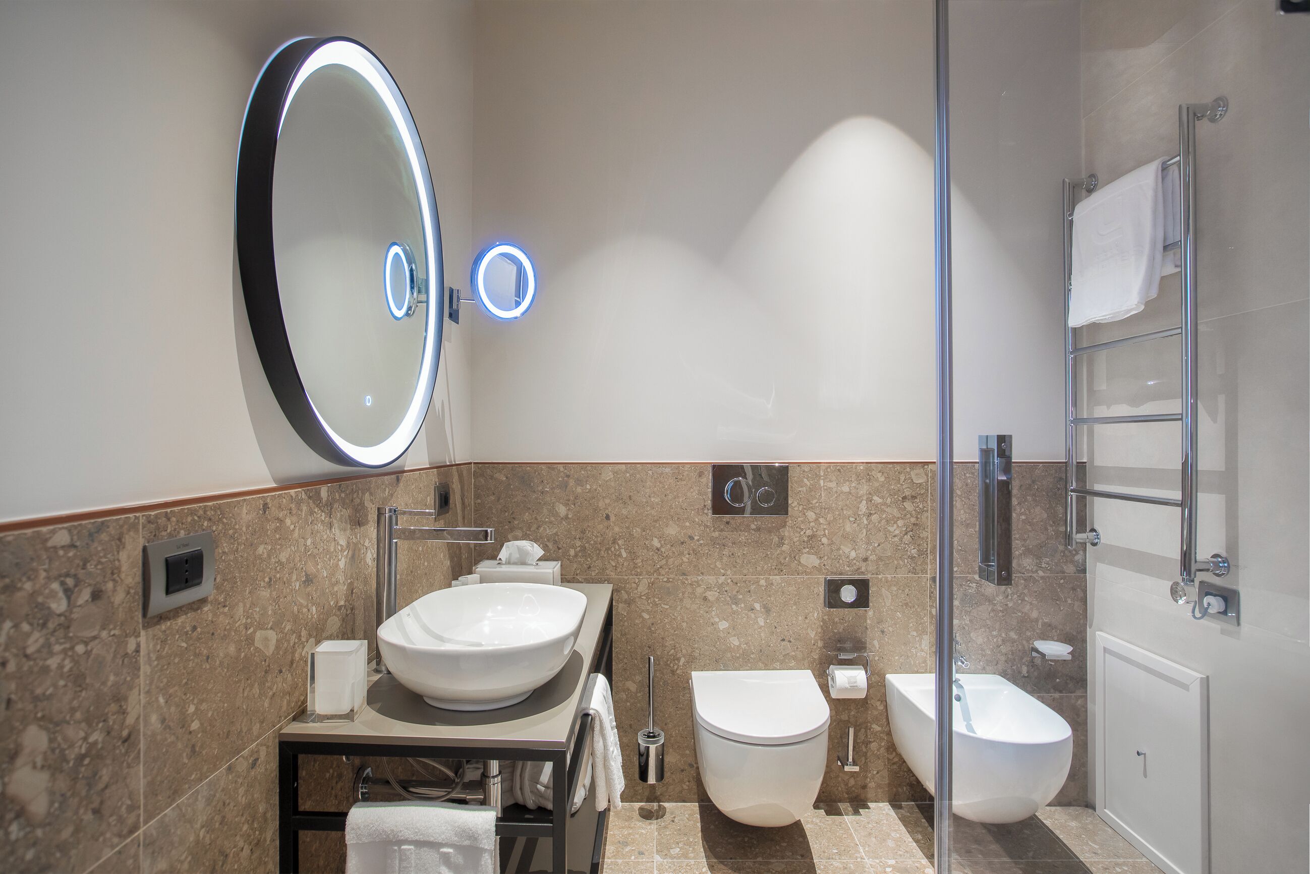 free toiletries, slippers, bidet, towels