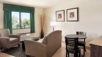 Desk, blackout drapes, iron/ironing board, free cribs/infant beds