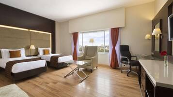 Premium bedding, pillow-top beds, in-room safe, desk