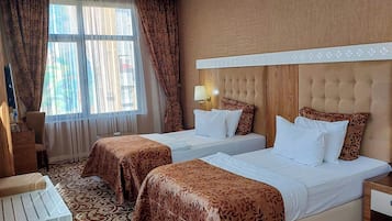 Minibar, in-room safe, desk, iron/ironing board (on request)