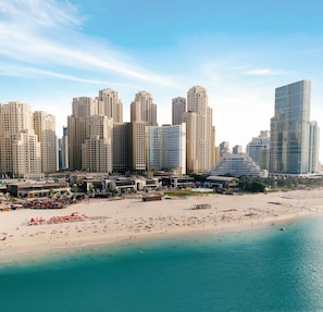 Beach nearby, beach umbrellas, beach towels
