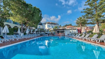 Outdoor pool, pool umbrellas, pool loungers