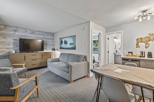 Queen Suite with Sofa bed (Self Check In, No Pets) | Living area | 50-inch flat-screen TV with cable channels, TV