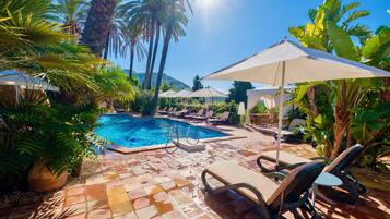 Seasonal outdoor pool, pool umbrellas, pool loungers