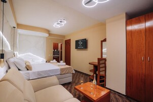 Luxury Studio Suite, 1 King Bed | 1 bedroom, minibar, individually decorated, blackout drapes