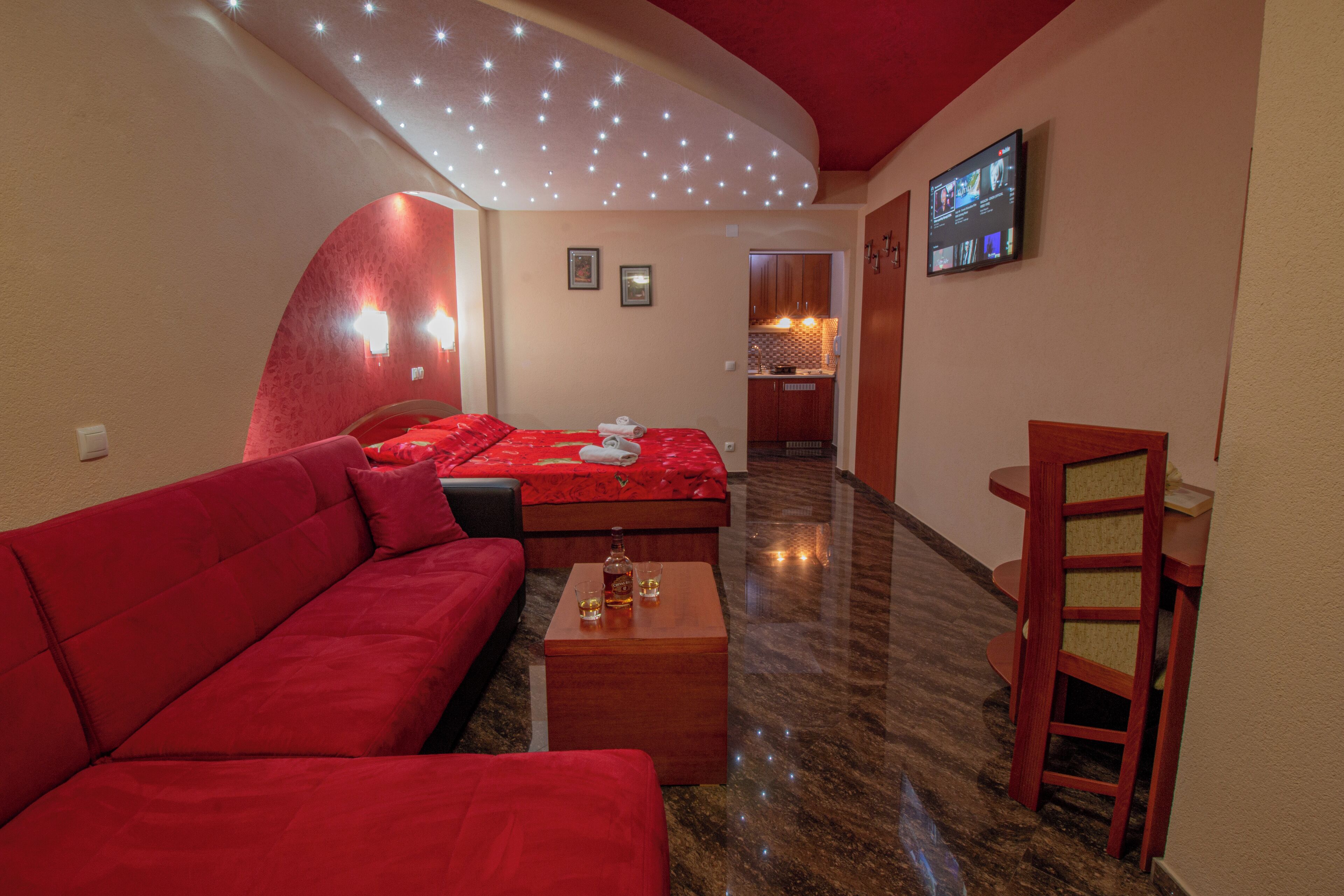 deluxe triple room, 1 bedroom, garden view | 1 bedroom, minibar, individually decorated, blackout curtains