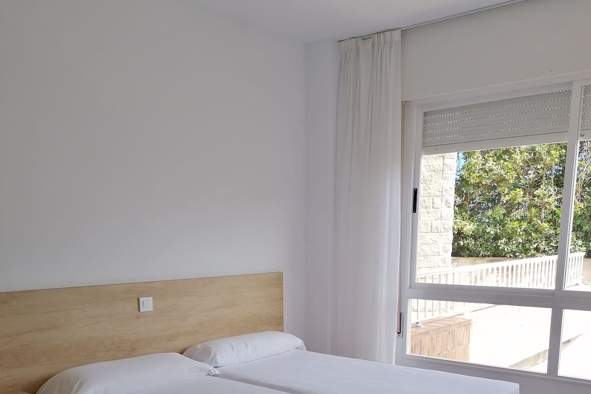 Apartemen Premium, 1 kamar tidur, pemandangan halaman | 2 kamar tidur, Wi-Fi gratis, dan seprai linen