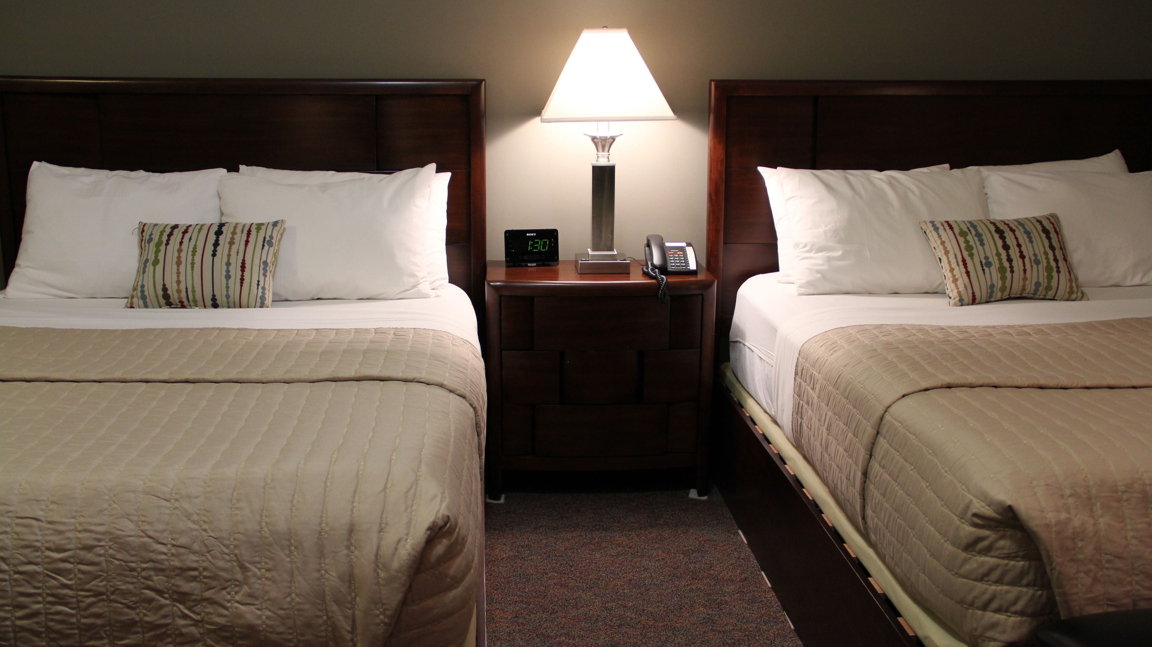 standard room, 2 queen beds, refrigerator & microwave | pillow-top beds, desk, blackout curtains, iron/ironing board