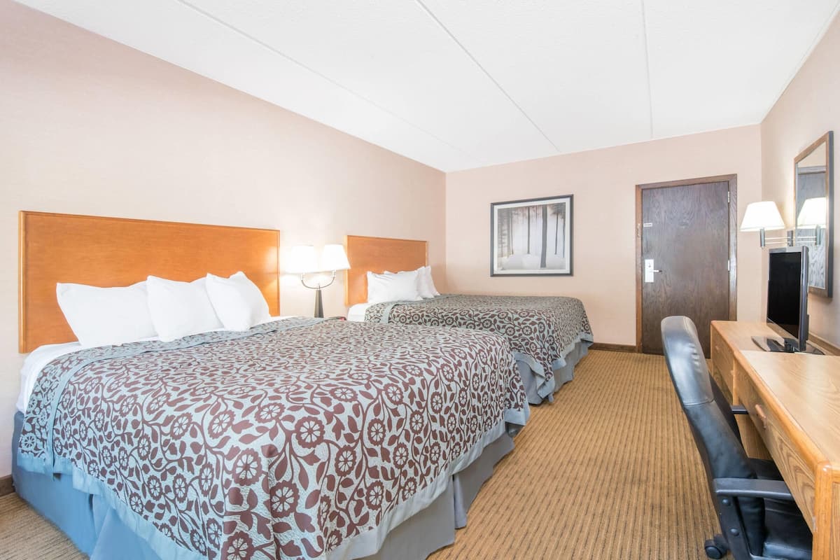Standard Room, 2 Queen Beds, Non Smoking | Iron/ironing board, free cribs/infant beds, free WiFi, bed sheets