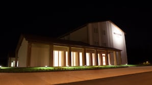 A large building with a prominent sign reading "BOLIDORO." - Boiardo Hotel (Scandiano)