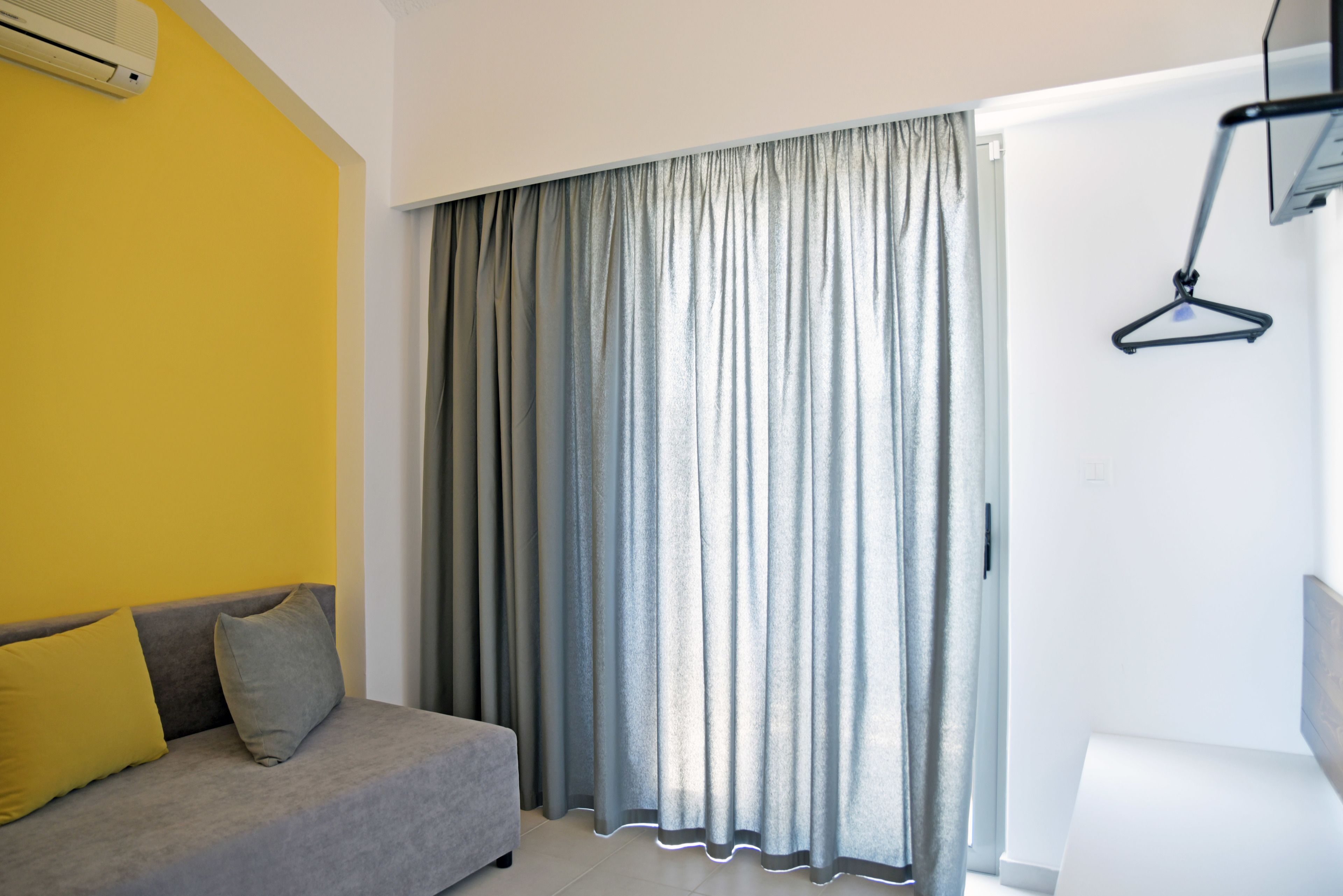 suite, 2 bedrooms, sea view | living room | flat-screen tv