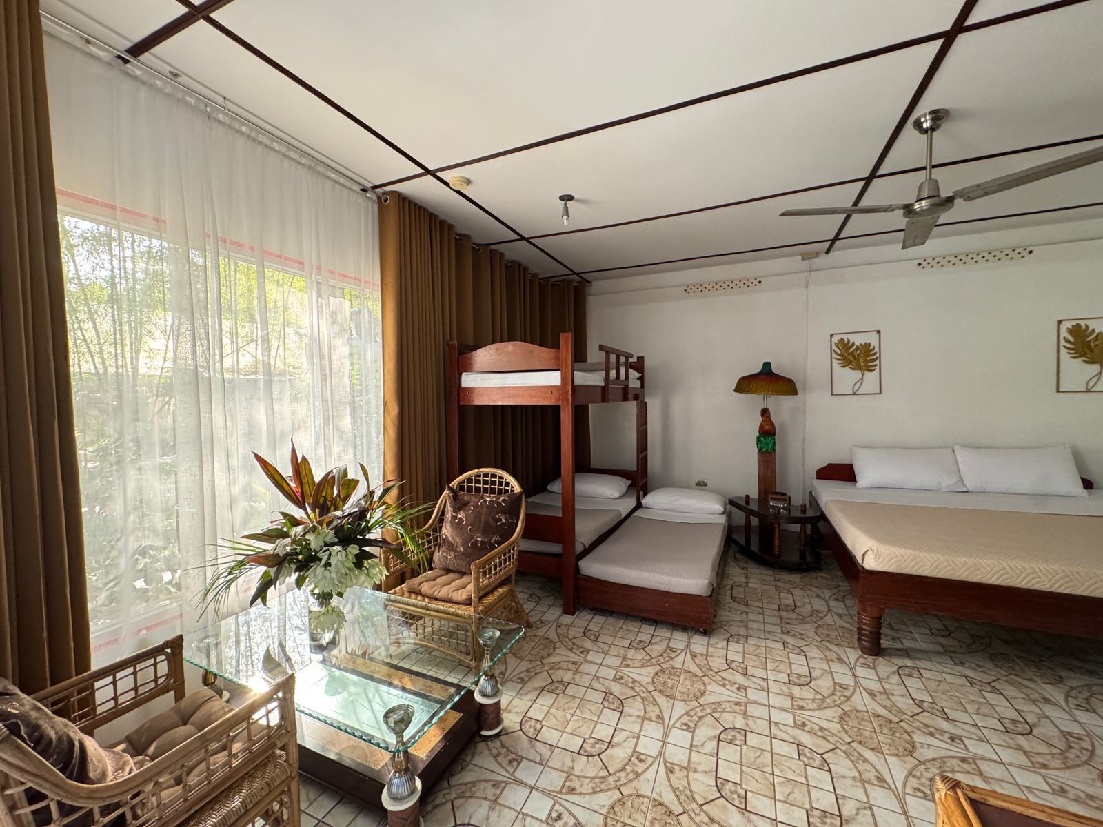 Junior Family Room | Minibar, in-room safe, individually decorated, desk