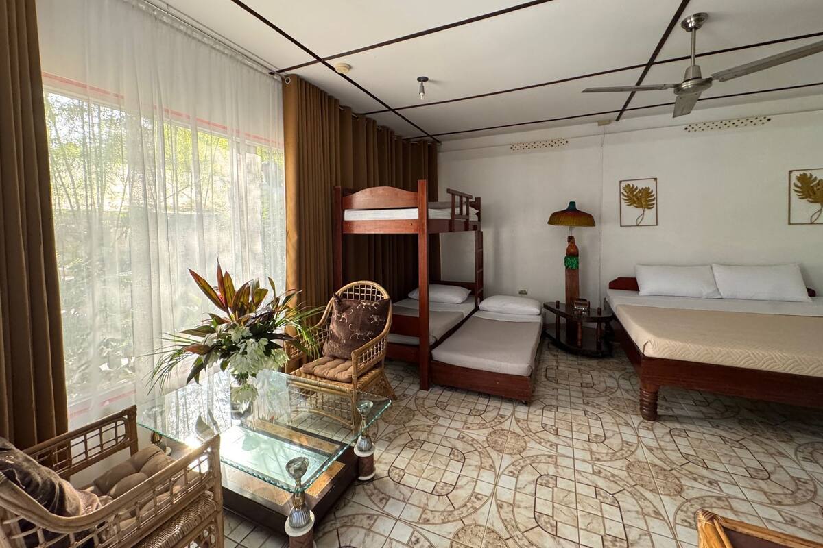 Junior Family Room | Minibar, in-room safe, desk, blackout drapes