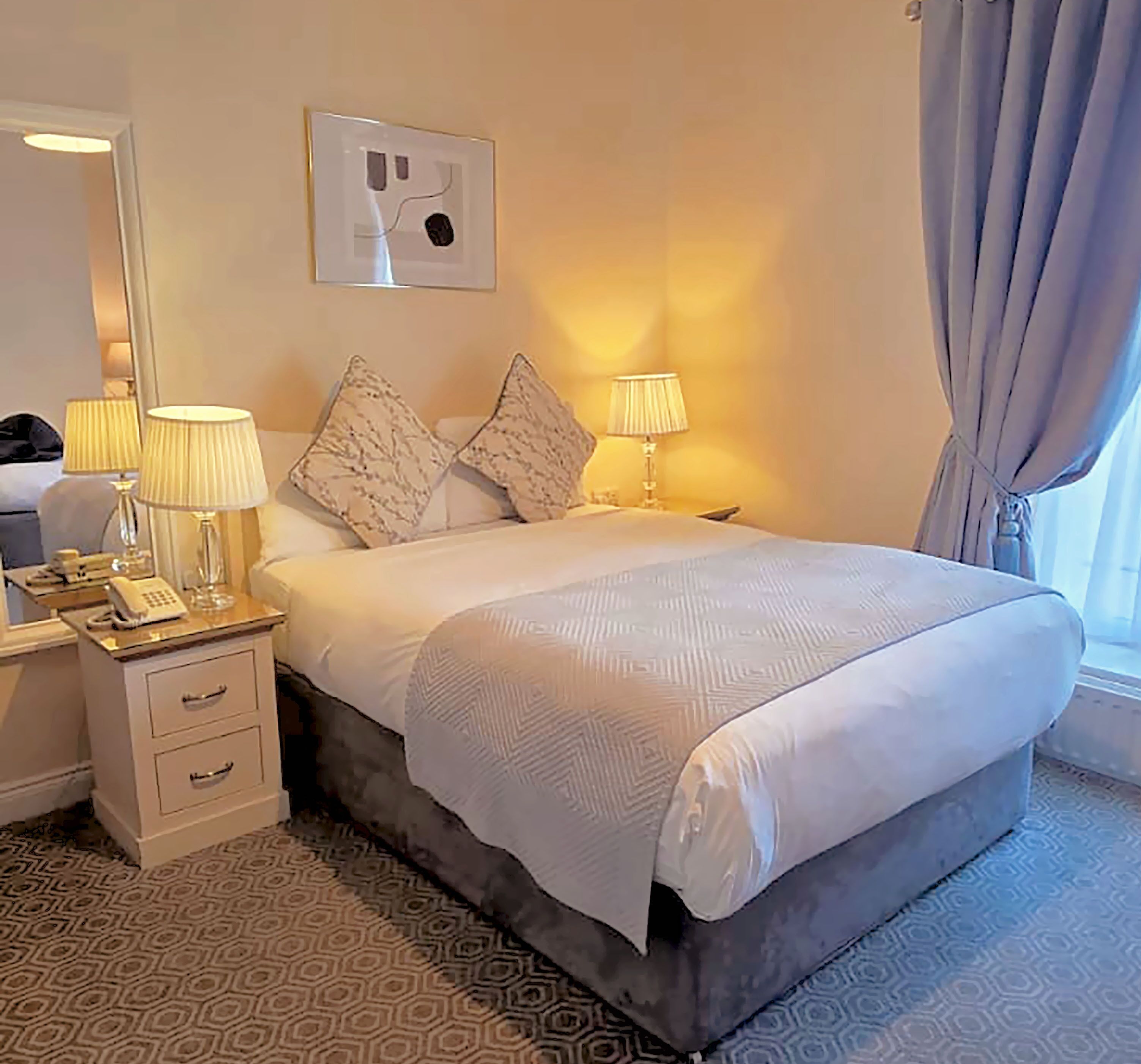 Premium bedding, down duvets, in-room safe, desk