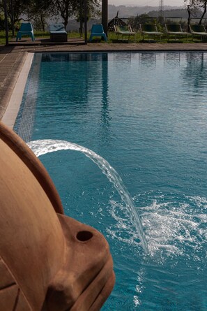 Outdoor pool, open 8:00 AM to 8:00 PM, pool umbrellas, sun loungers