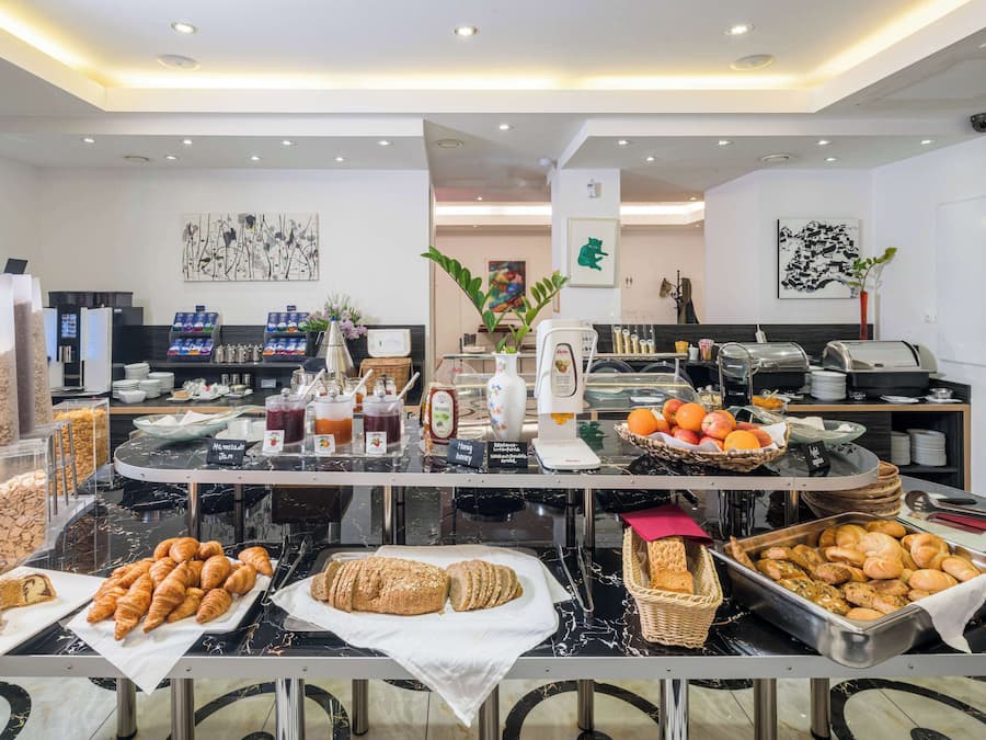 Daily buffet breakfast (EUR 18 per person)