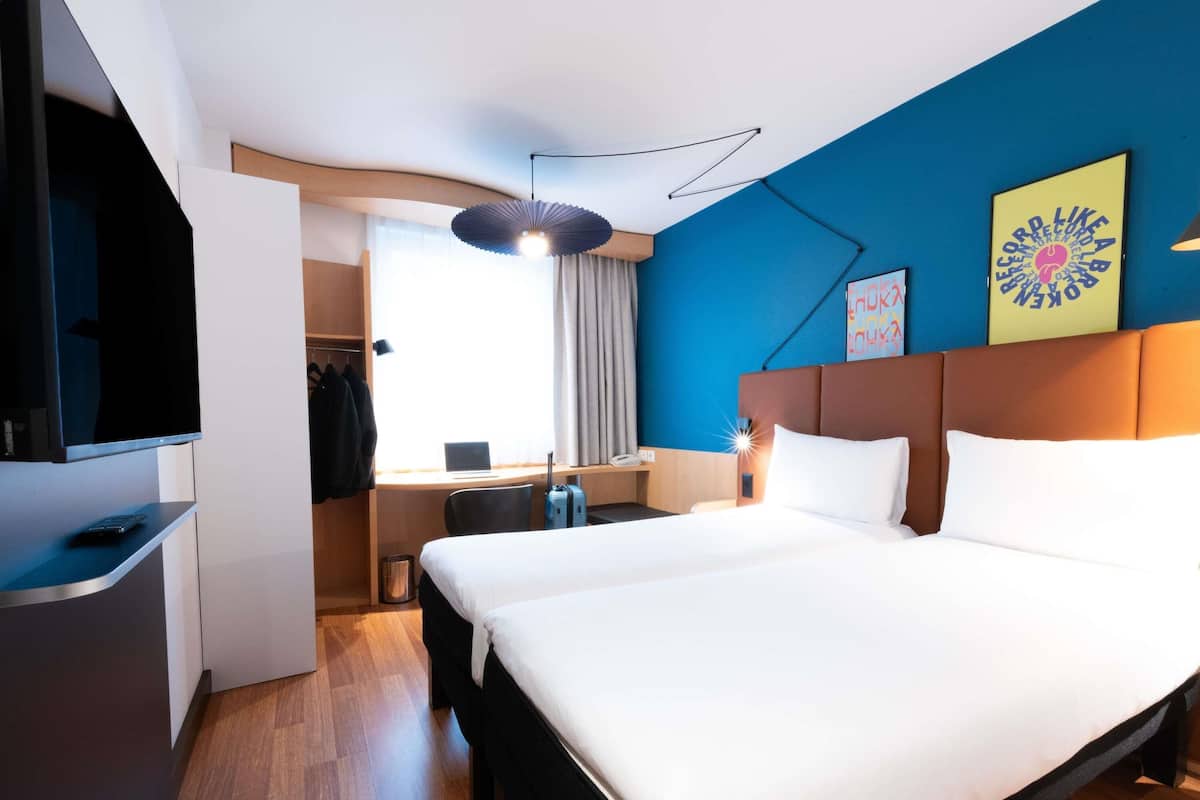 Premium bedding, pillowtop beds, desk, laptop workspace