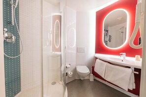 Shower, eco-friendly toiletries, hair dryer, towels