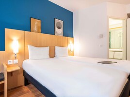 Premium bedding, pillowtop beds, desk, laptop workspace