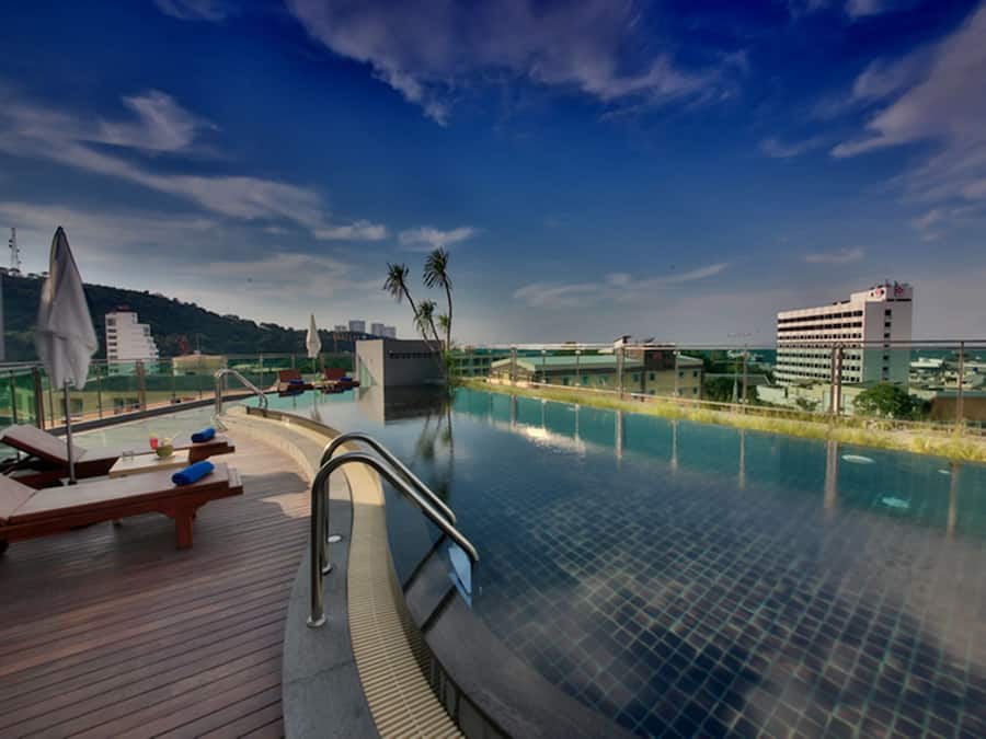 Outdoor pool, pool umbrellas, sun loungers