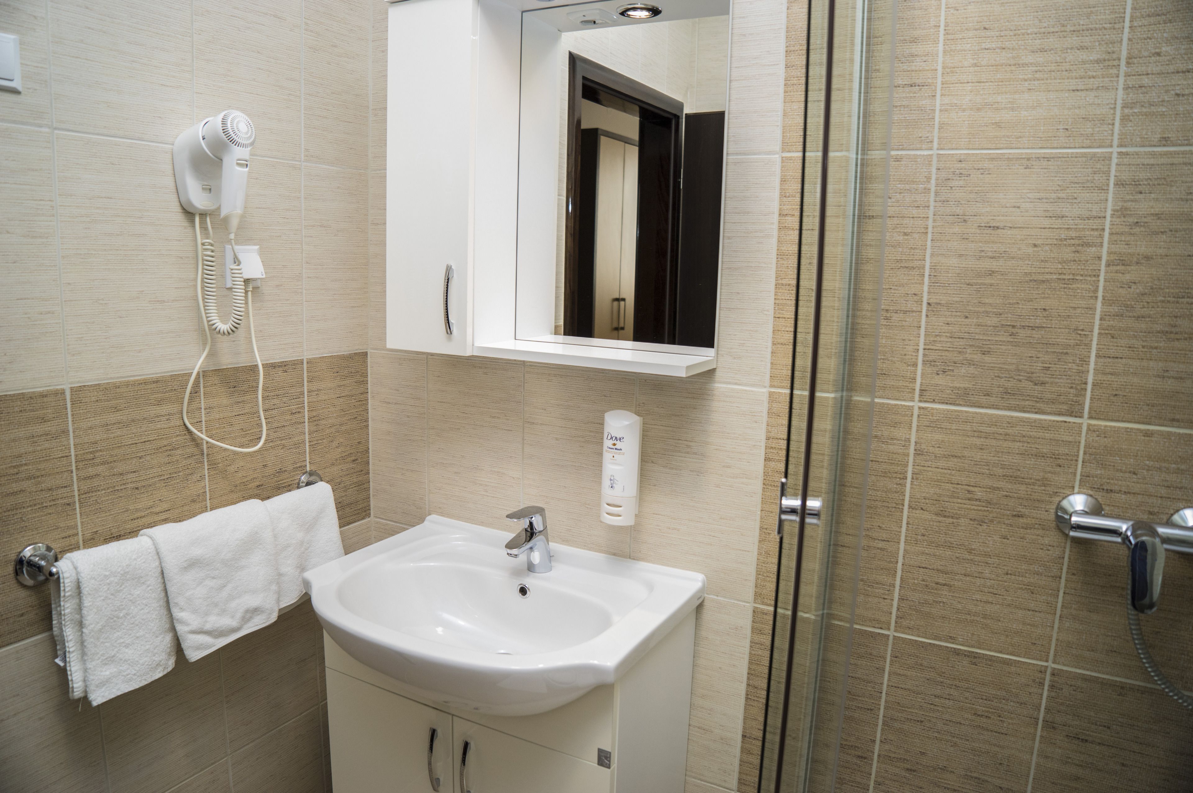 shower, free toiletries, hair dryer, slippers