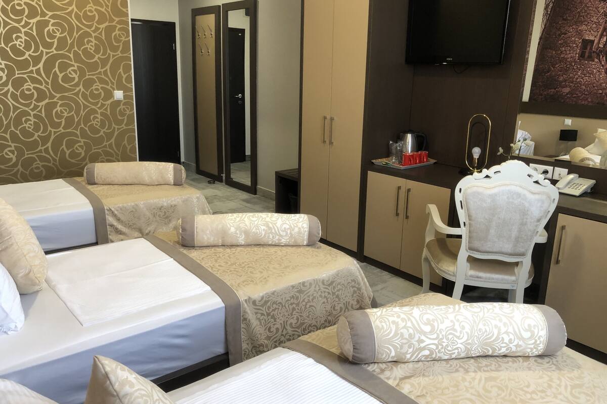 standard triple room | premium bedding, in-room safe, desk, blackout curtains